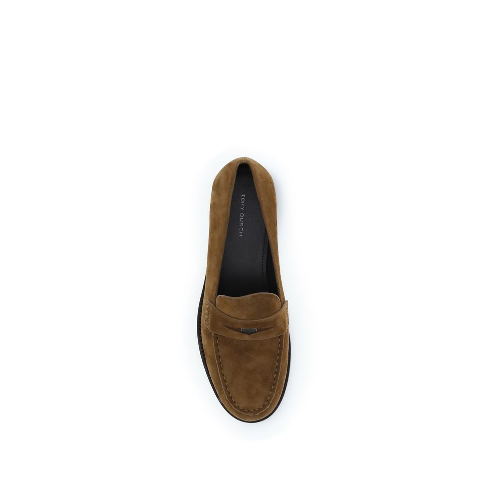 Flat Loafer Slip-On Shoes by Tory Burch for women in bos taurus calf nappa & suede leather beige showcases a impeccable silhouette as Women's Bos Taurus Calf Nappa & Suede Leather Flat Loafer Slip-On Shoes, artfully designed with a impeccable flat and refined for a impeccable finish.