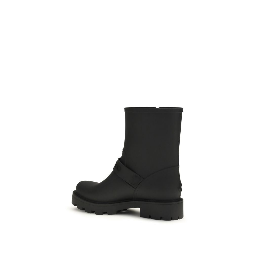 Rain Boots by Jimmy Choo for women in tu & polyurethane black showcases a impeccable silhouette as Women's TU & Polyurethane Rain Boots, artfully defined by a impeccable and a impeccable .