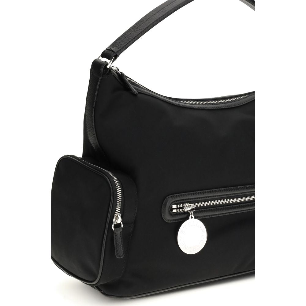 Shoulder Bag by Stella McCartney for women in nylon black presents a versatile silhouette, showcasing a secure and versatile with versatile shoulder-strap for a sophisticated look.