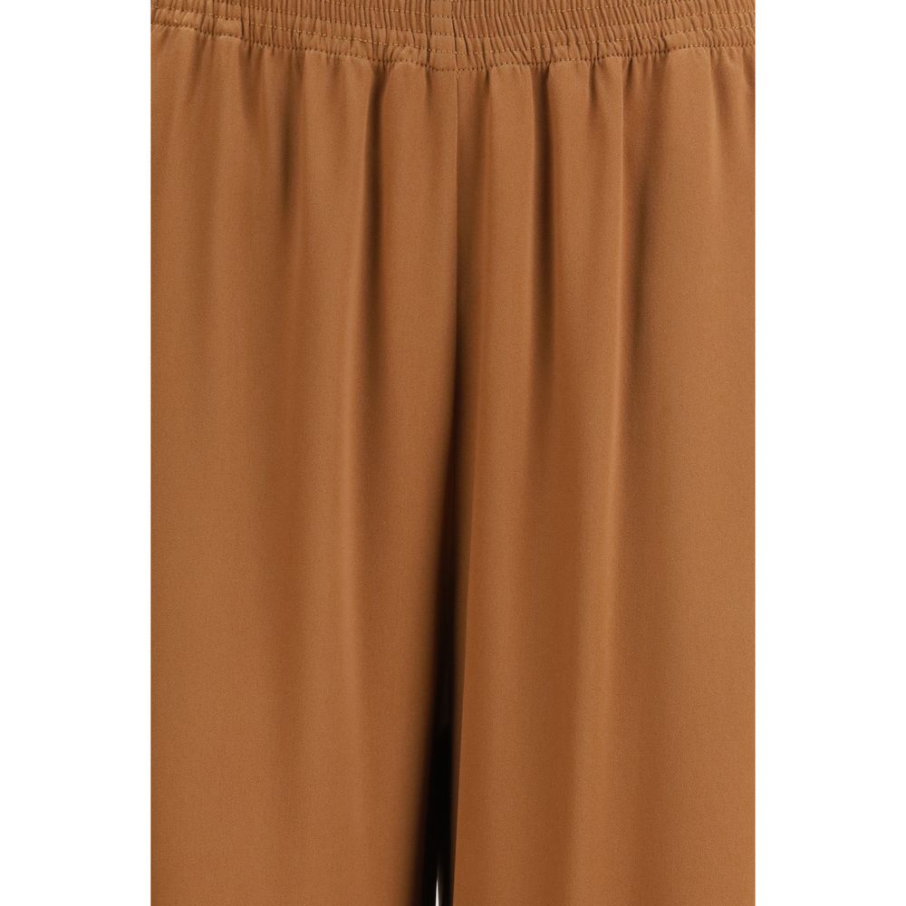 Trousers by Fabiana Filippi for women in viscose acetate beige features a tailored silhouette with a tailored straight & regular-fit, defined by its long and a sophisticated high rise.