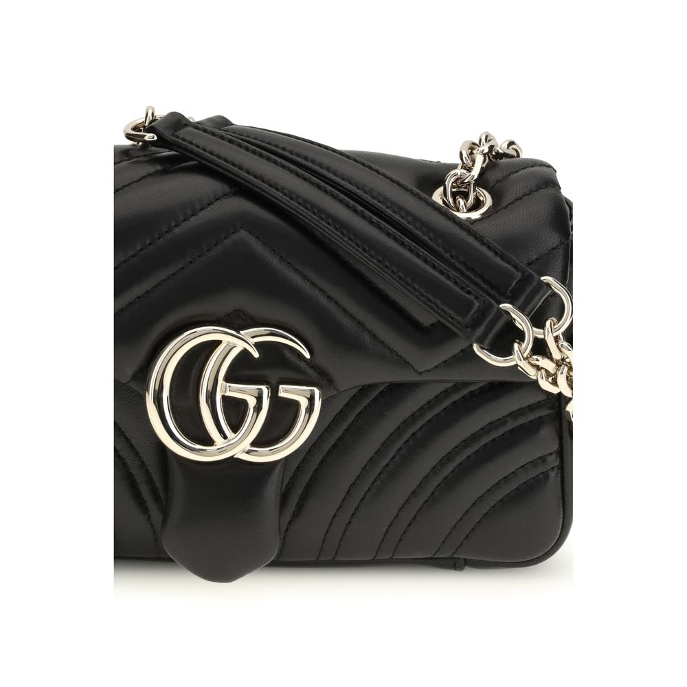 Small Shoulder Flap Bag by Gucci for women in bos taurus nappa leather black, gold, red, patterned & chevron presents a versatile silhouette, showcasing a secure flap and versatile with versatile shoulder-strap for a sophisticated look.
