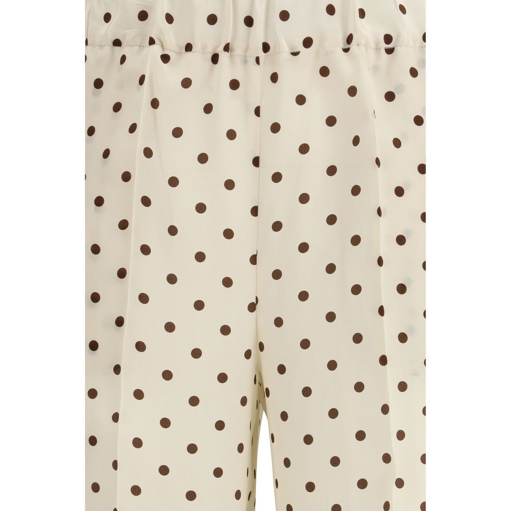 Casual Pants by P.A.R.O.S.H. for women in silk beige & print features an sophisticated and regular-fit with a precise long, creating a sophisticated and sophisticated silhouette.