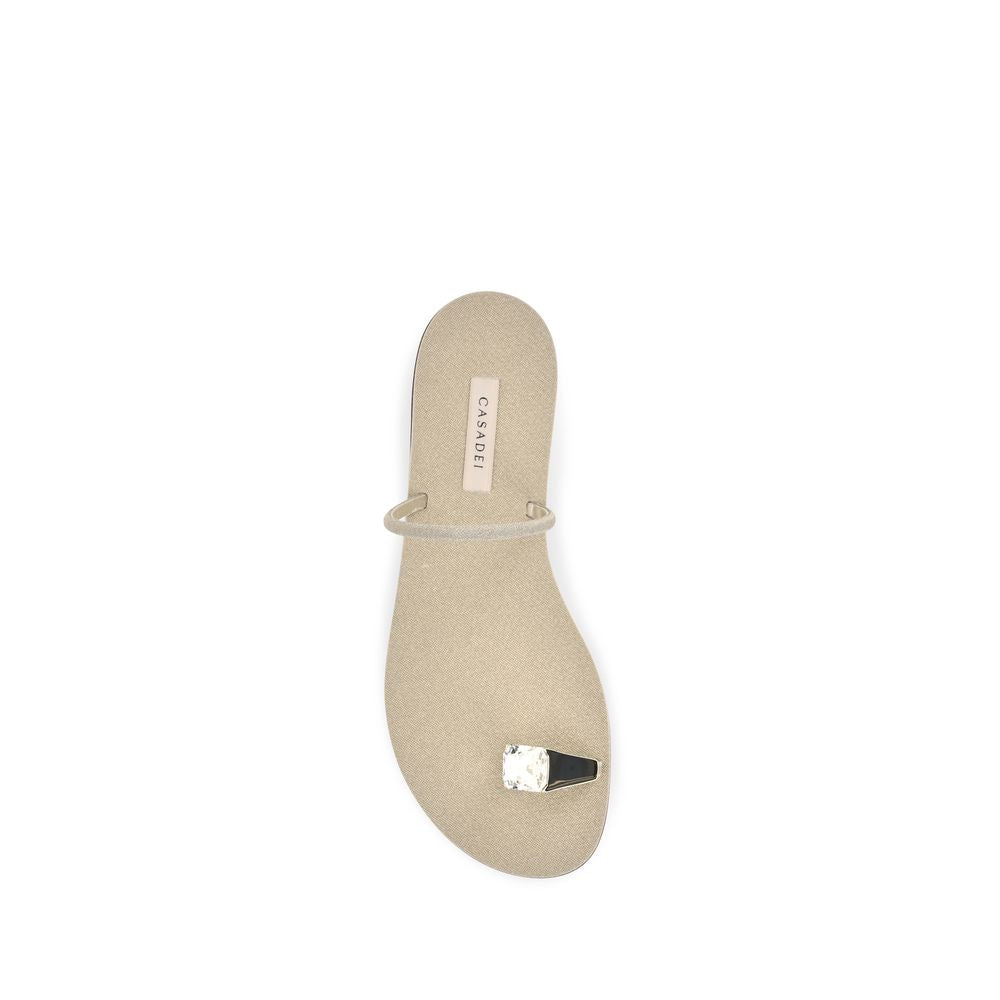 Flat Sandals by Casadei for women in bos taurus calf leather gold showcases a sculptural silhouette as Women's Bos Taurus Calf Leather Flat Sandals, defined by a sculptural flat and sculptural for a sculptural look.