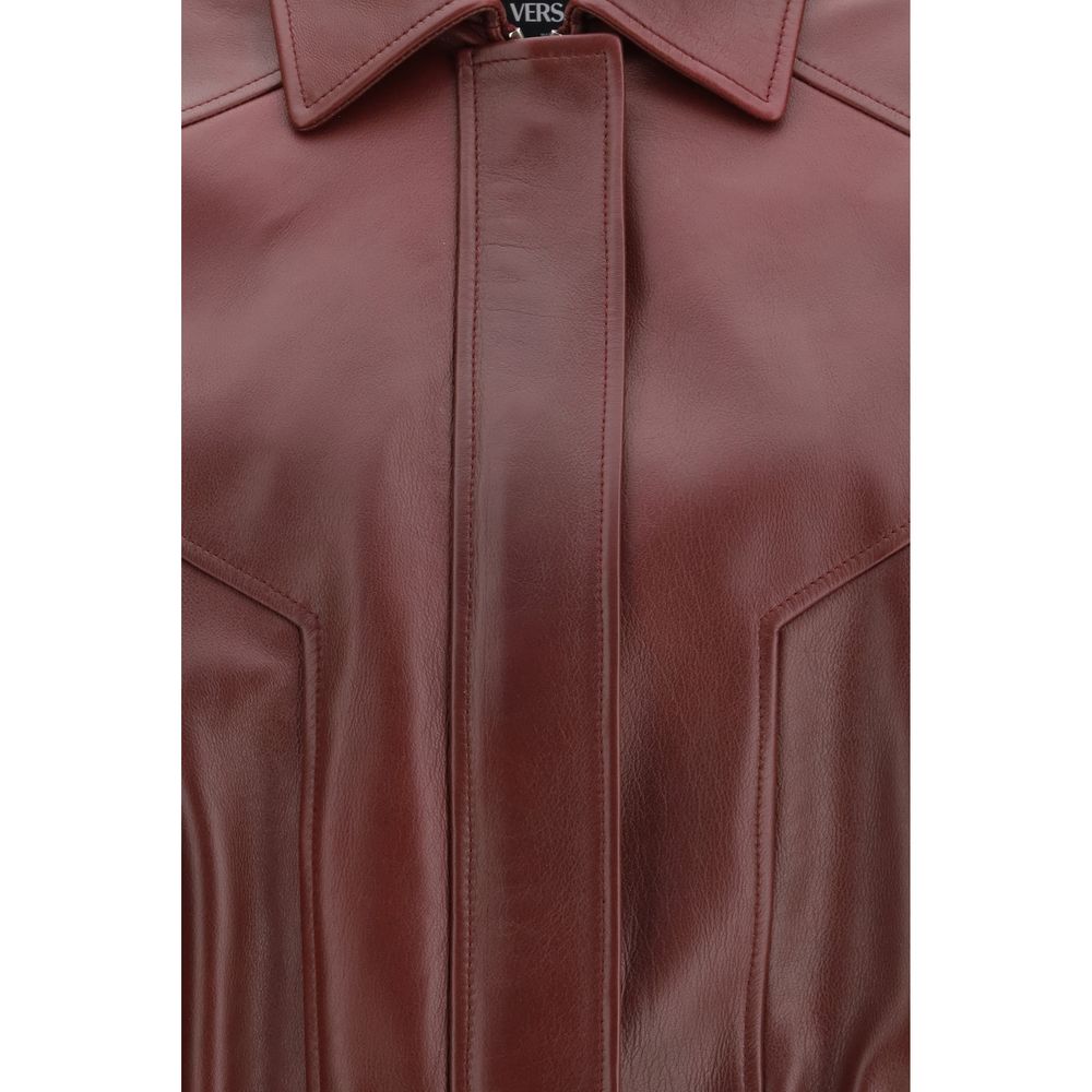 Jacket by Versace for women in bos taurus calf leather bordeaux showcases a enveloping silhouette, artfully detailed with a enveloping and premium pockets for a truly enveloping finish.