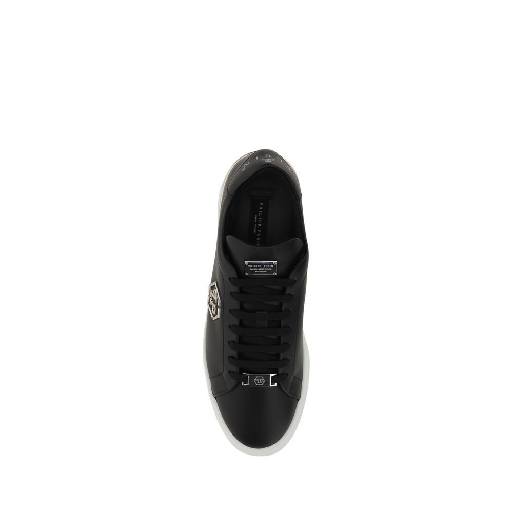 Sneakers by Philipp Plein for men in bos taurus calfskin leather black & monogram features an timeless silhouette from the Men's Low Top Bos Taurus Calfskin Leather Sneakers collection, showcasing a signature low-top style with an timeless finish.