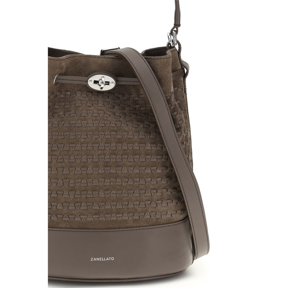 Shoulder Baguette Handbag by Zanellato for women in bos taurus calf suede leather brown presents a ornamental silhouette, showcasing a secure drawstring, ample , and versatile shoulder-strap, handle & adjustable-strap for a ornamental finish.