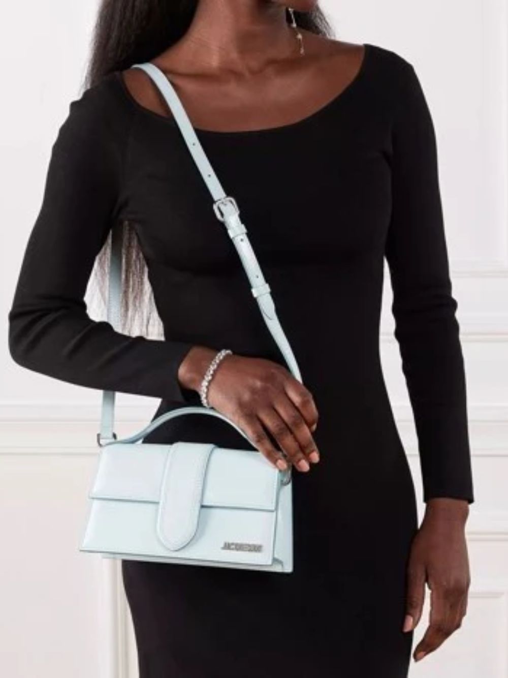 Small Crossbody Flap Handbag by Jacquemus for women in leather blue, brown & silver showcases a versatile sophistication silhouette, featuring a secure flap & magnetic, versatile sophistication cardholder, and versatile crossbody-strap, shoulder-strap, adjustable-strap & handle for a versatile sophistication finish.