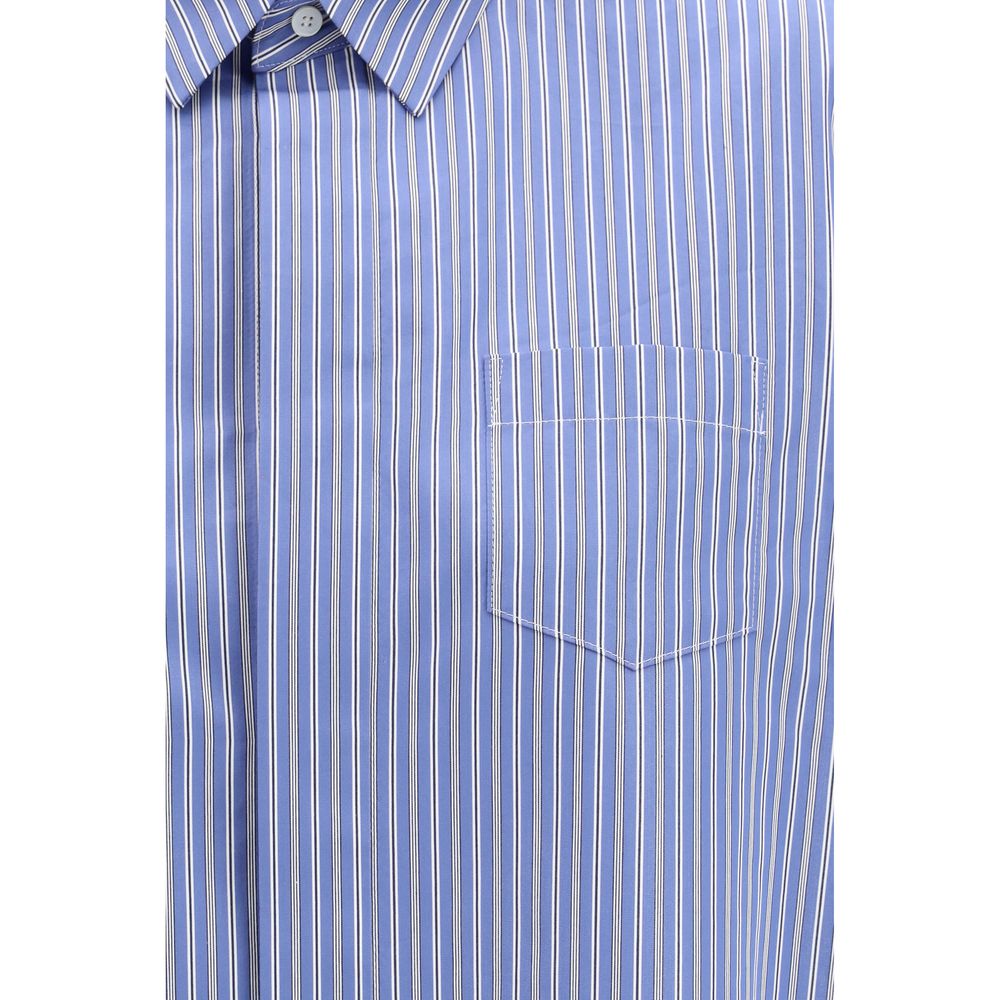 Shirt by Sacai for women in cotton & polyester blue, patterned & striped showcases a sleek silhouette, elegantly detailed with a sleek and for a sleek finish.