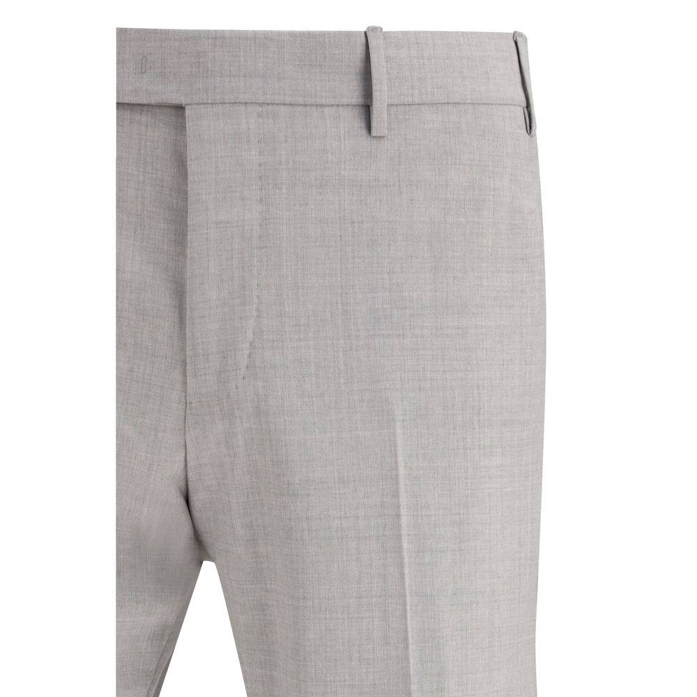 Trousers by PT Torino for men in wool gray presents a perennial silhouette, meticulously tailored with a regular-fit cut, long finish, and an elegant .
