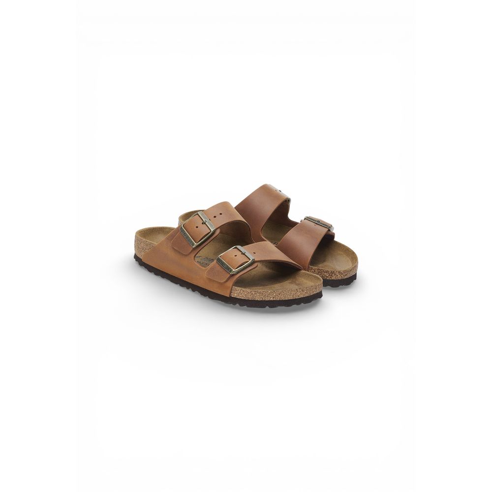 Flat Sandals by Birkenstock for men in leather & cork brown features an architectural design from the Men's Lightweight Leather & Cork Flat Sandals collection, defined by a architectural flat and for a architectural finish.