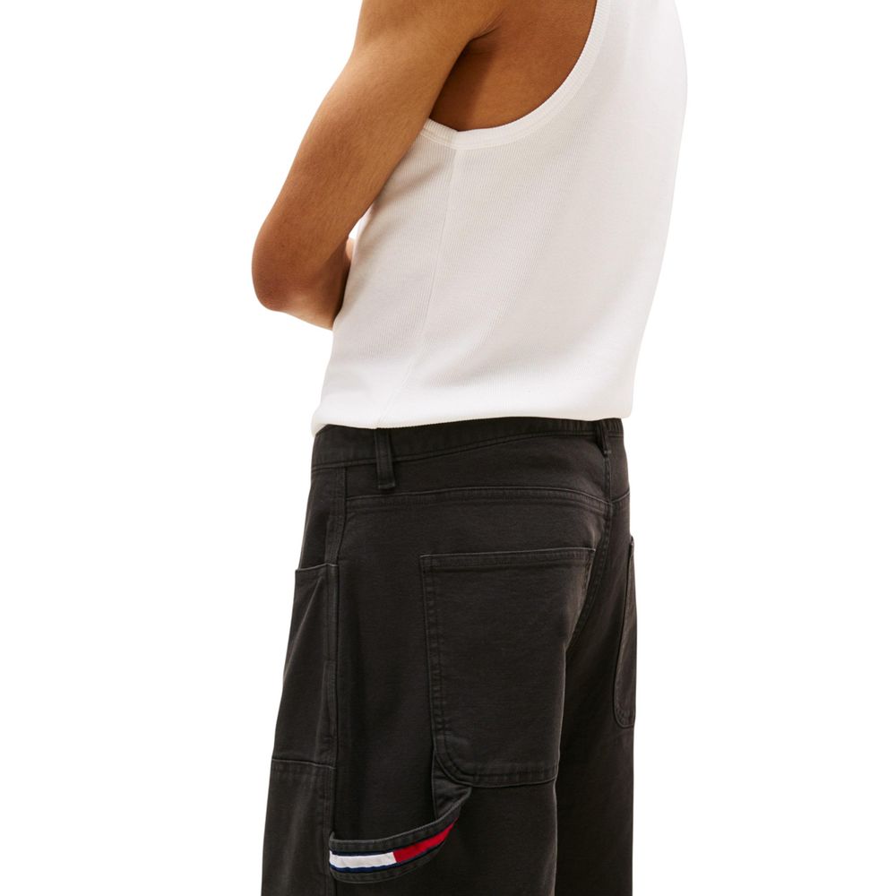 Trousers by Tommy Hilfiger Jeans for men in stretch organic cotton black presents a perennial silhouette, meticulously tailored with a relaxed-fit & regular-fit cut, long finish, and an elegant .