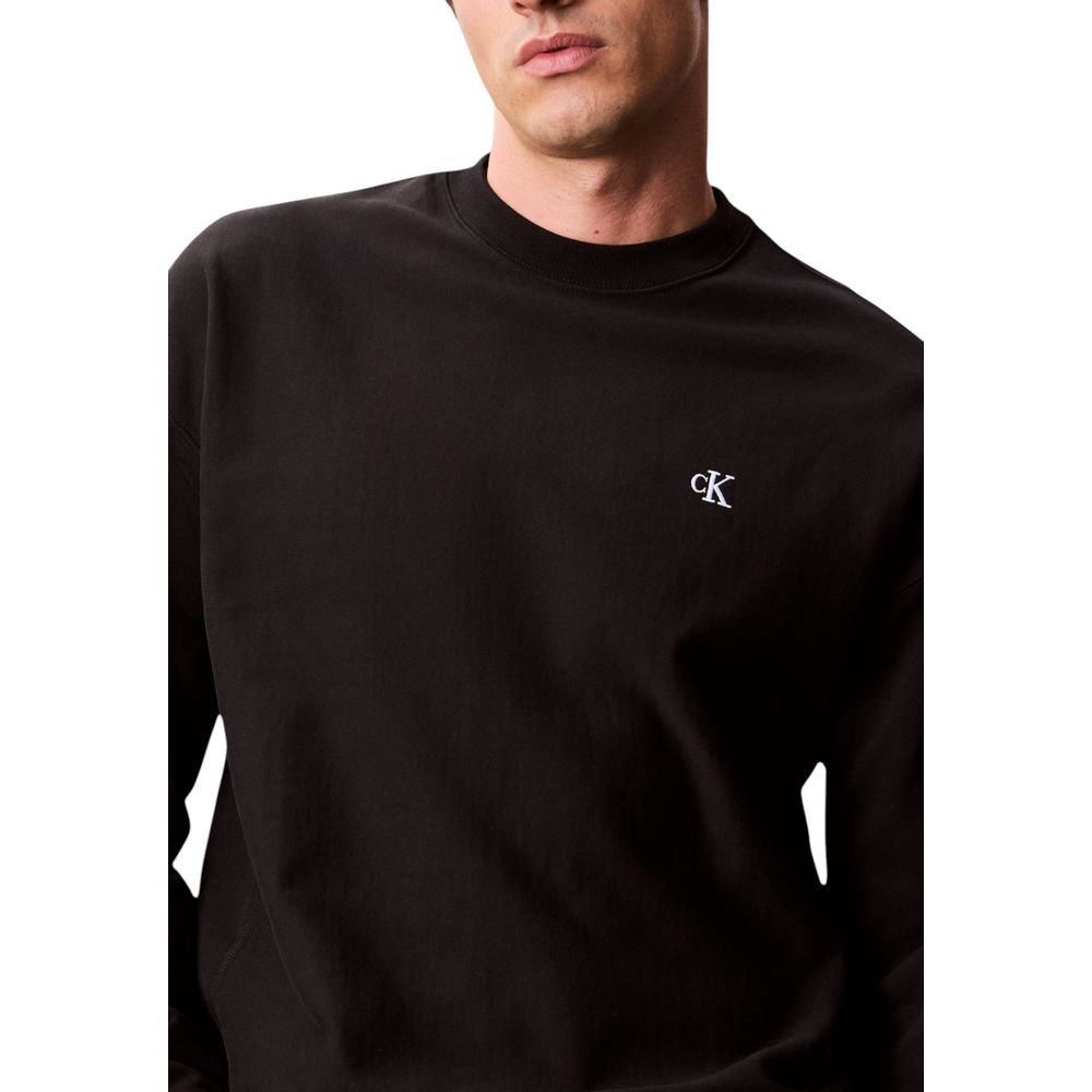 Activewear Sweatshirt by Calvin Klein Jeans for men in polyester cotton terrycloth black presents a ergonomic silhouette, showcasing a sophisticated and detailed with premium for a ergonomic finish.