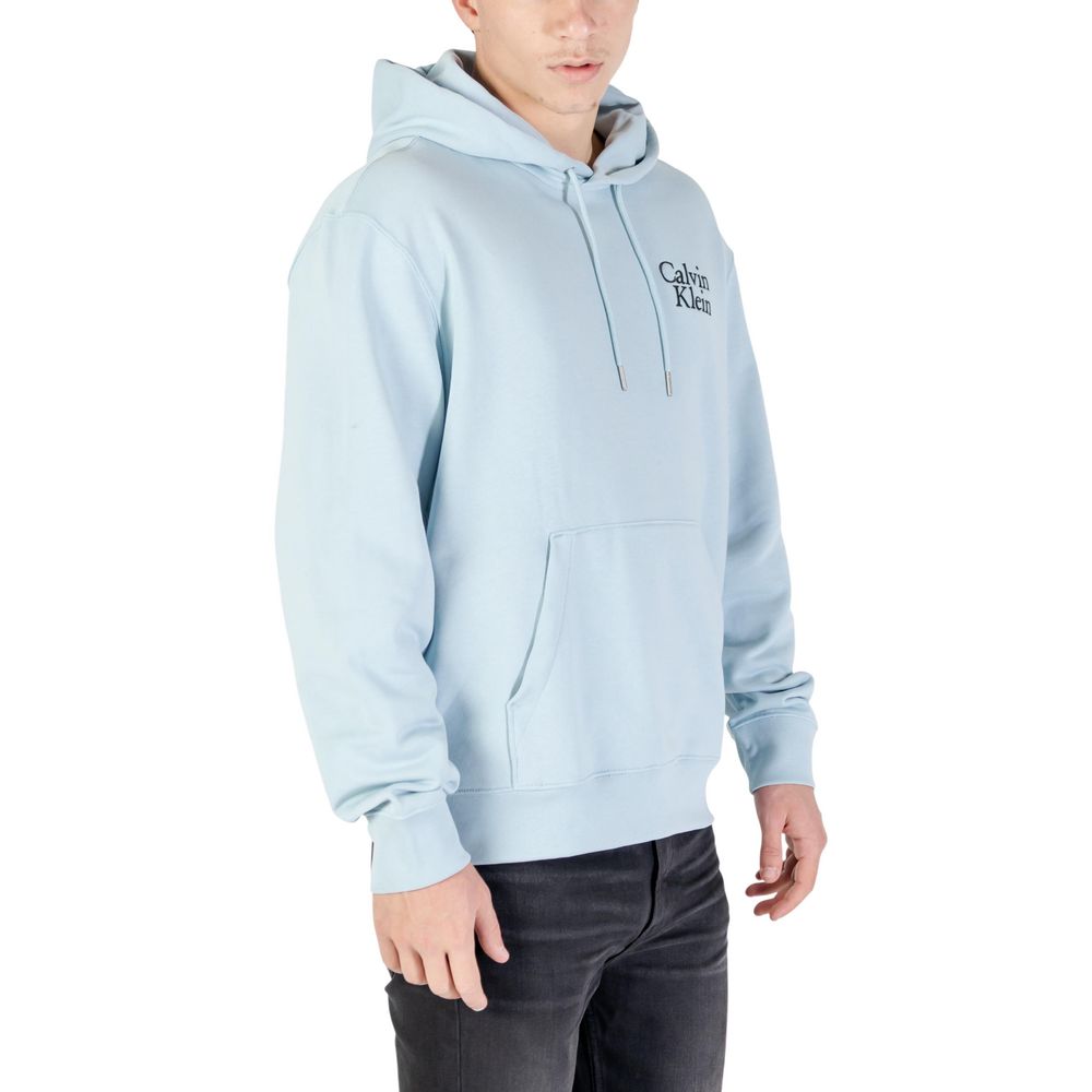 Hooded Hoodie by Calvin Klein Jeans for men in cotton & kangaroo blue features a slouchy chic silhouette, detailed with a slouchy chic and a signature hooded neckline for an elevated aesthetic.