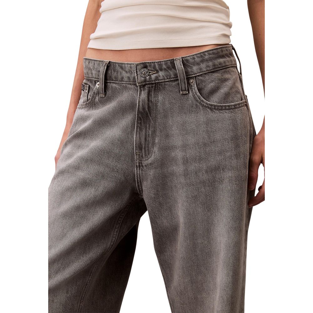 Jeans by Calvin Klein Jeans for women in lyocell & denim cotton gray presents a tailored silhouette, showcasing a tailored relaxed-fit, wide & boyfriend and long cut with a refined low rise for a truly tailored aesthetic.