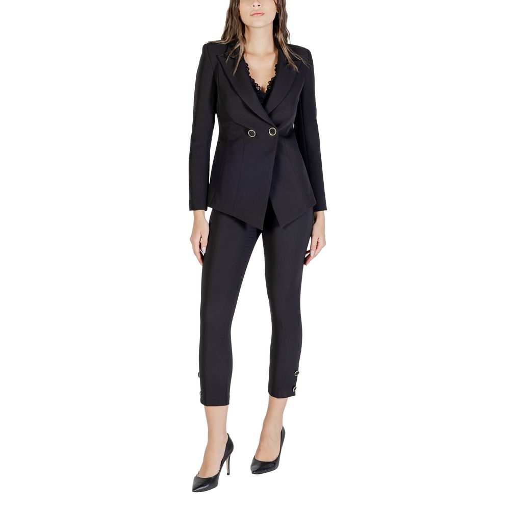 Trousers by Rinascimento for women in stretch polyester black features a tailored silhouette with a tailored cigarette, defined by its long and a sophisticated high rise.