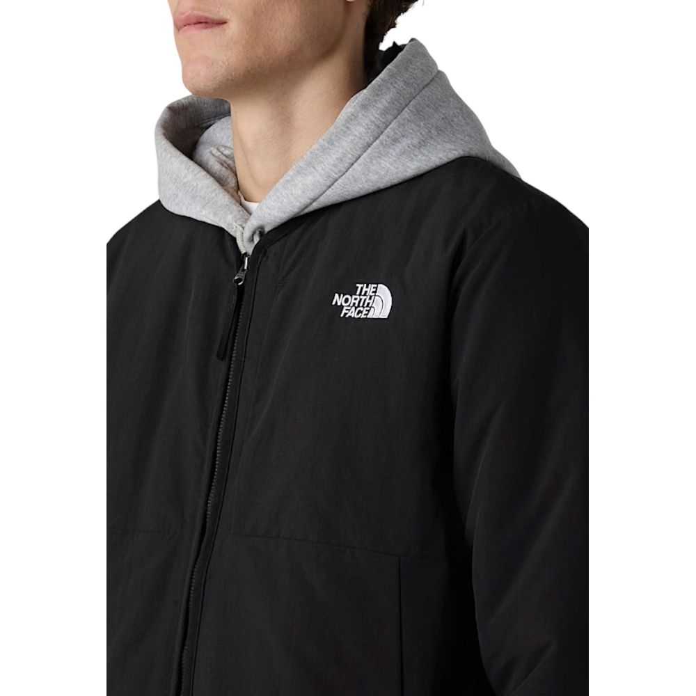 Hooded Overcoat by The North Face for men in nylon black features an voluminous silhouette, showcasing distinct lightweight, pockets & hooded and a voluminous for a truly voluminous aesthetic.