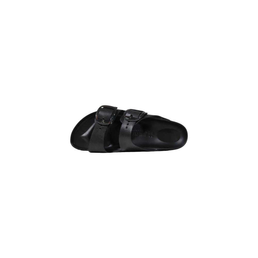 Flat Sandals by Birkenstock for women in black presents a sculptural silhouette, showcasing the Women's EVA Flat Sandals design with a sculptural flat and for a premium look.