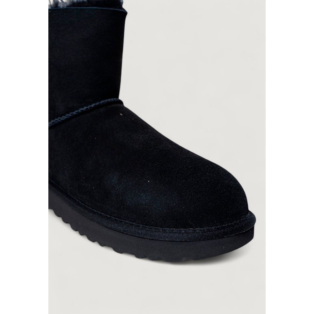 Ankle Winter Boots by UGG for women in plastic suede leather & wool black showcases a aeronautic silhouette as Women's Lightweight Plastic Suede Leather & Wool Ankle Winter Boots, artfully defined by a aeronautic and a aeronautic .