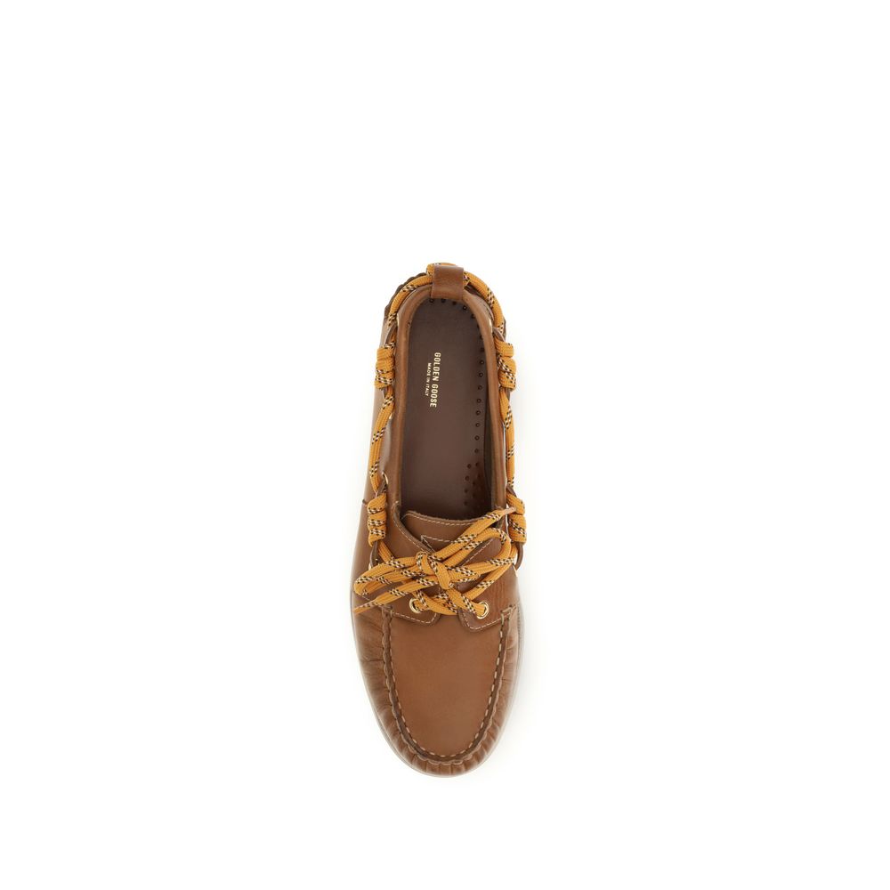 Flat Boat Loafer Slip-On Shoes by Golden Goose for women in bos taurus calf leather brown, gold & orange showcases a timeless silhouette from the Women's Bos Taurus Calf Leather Flat Boat Loafer Slip-On Shoes collection, featuring a timeless flat and for a timeless finish.