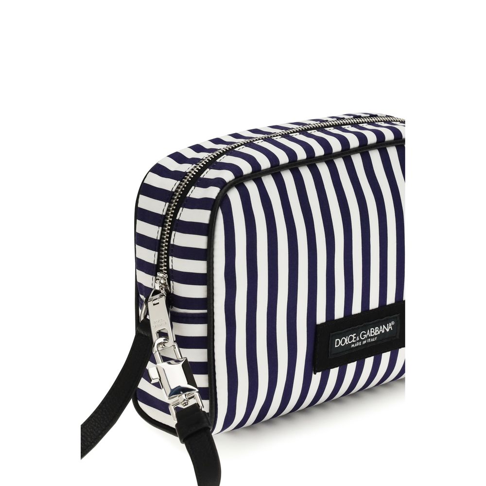 This Handbag by Dolce & Gabbana for unisex in bos taurus nubuck calf leather polyester & viscose and multicolor, palladium, signature & striped presents a sculptural silhouette featuring a secure zipper, ample cardholder, and versatile handle for a sculptural finish.