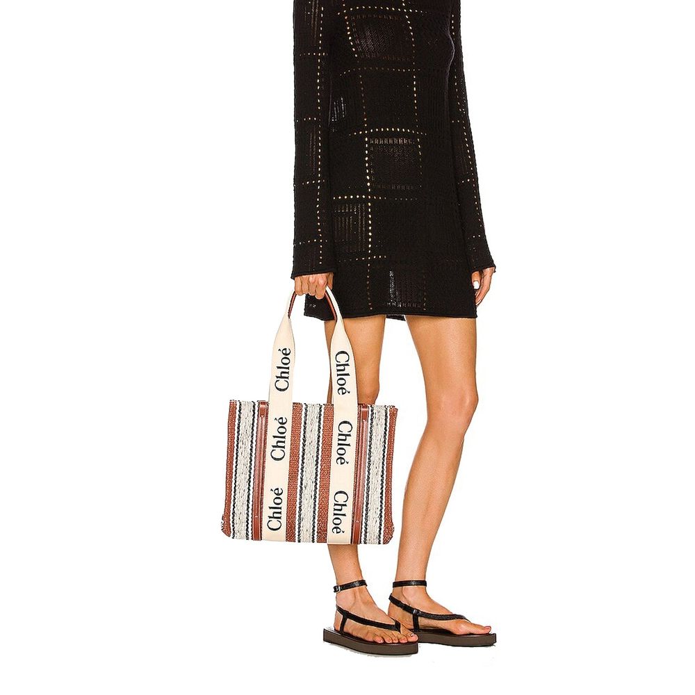 Large Tote Bag by Chloé for women in cotton polyester canvas brown & signature features a jet-set Cotton Polyester Canvas Large Tote Bag design, complete with a secure , ample , and versatile handle for a jet-set look.