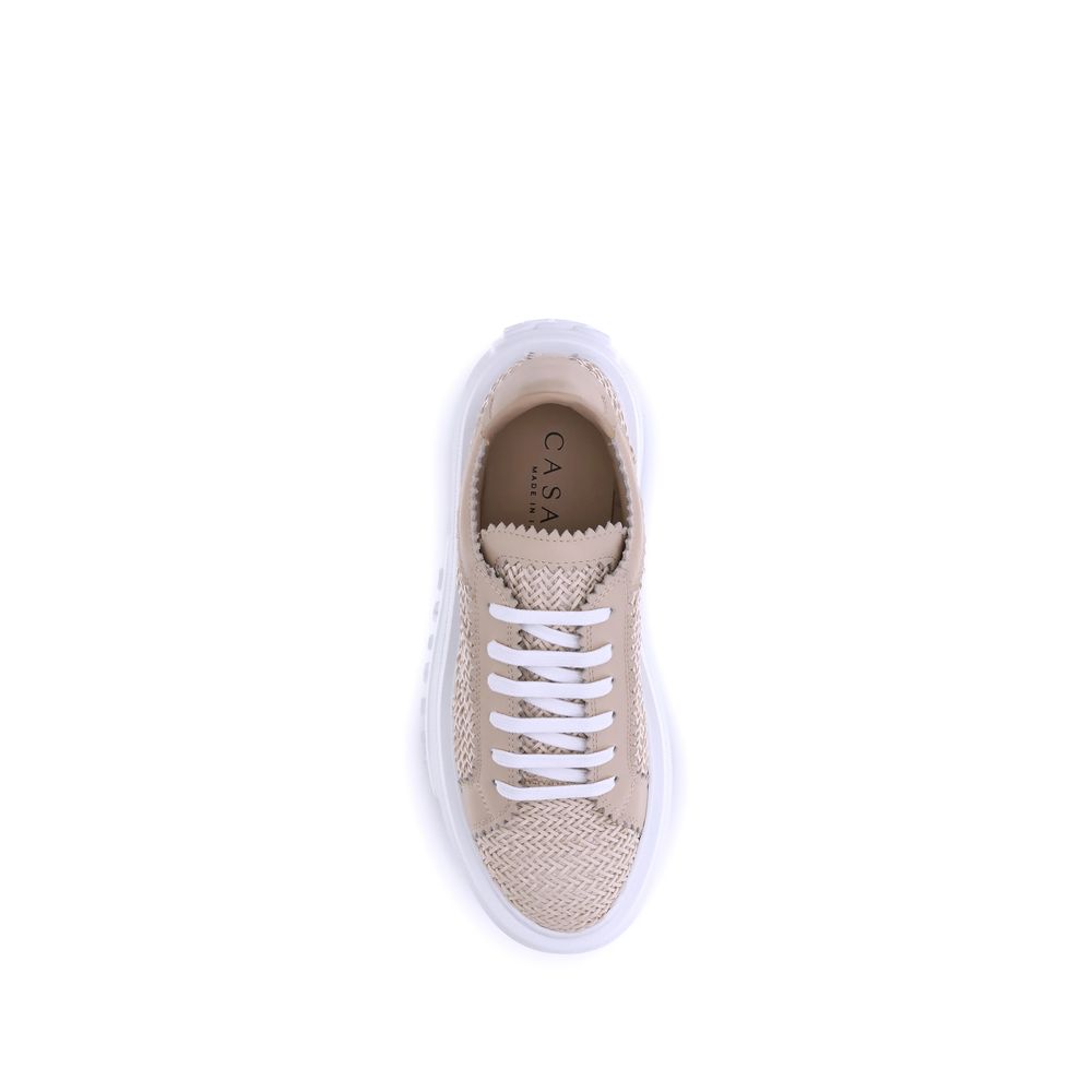 Sneakers by Casadei for women in faux leather beige & monogram presents a sumptuous silhouette, artfully capturing the essence of the Nexus Women's Chunky Faux Leather Sneakers with its sumptuous chunky style design.