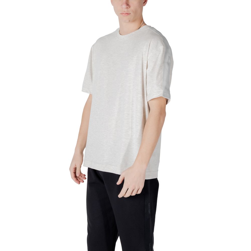 Activewear T-Shirt by Calvin Klein Sport for men in stretch polyester cotton gray features a dynamic silhouette with and enhanced by functional breathable-design.