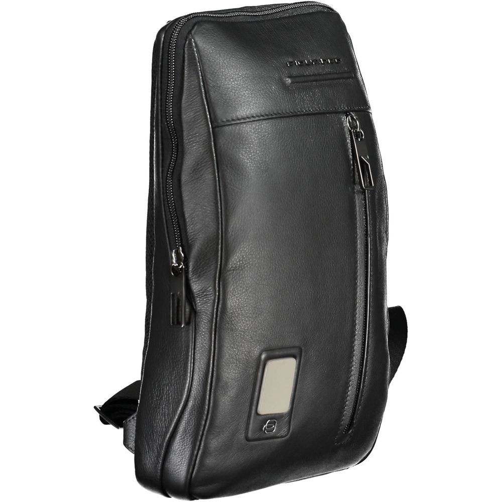 Shoulder Bag by Piquadro for men in leather black features a stately silhouette, showcasing a secure zipper, ample external-pockets, internal-pockets & laptop-compartment, and stately shoulder-strap for a stately finish.