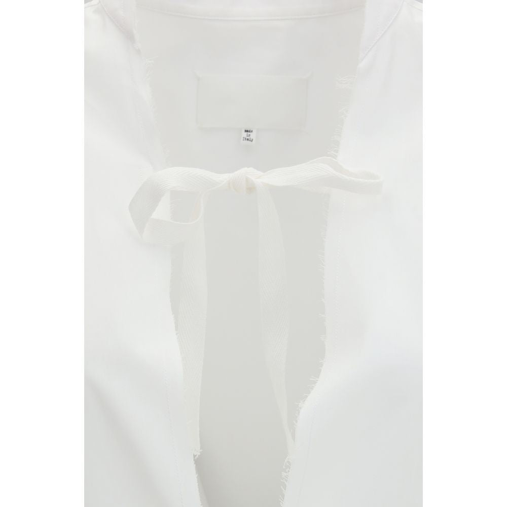 Dress by Maison Margiela for women in cotton white features an eye catching silhouette with a sophisticated , elegant , and a refined short mini for a eye catching aesthetic.