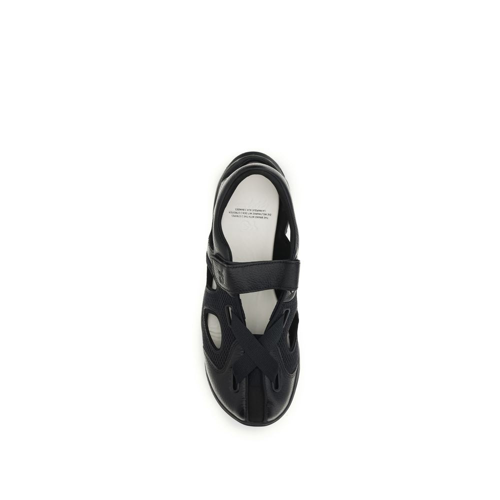 Flat Sandals by Y-3 for men in bos taurus suede calf leather black features an effortlessly chic silhouette from the Men's Bos Taurus Suede Calf Leather Flat Sandals collection, showcasing a effortlessly chic flat and elegant .