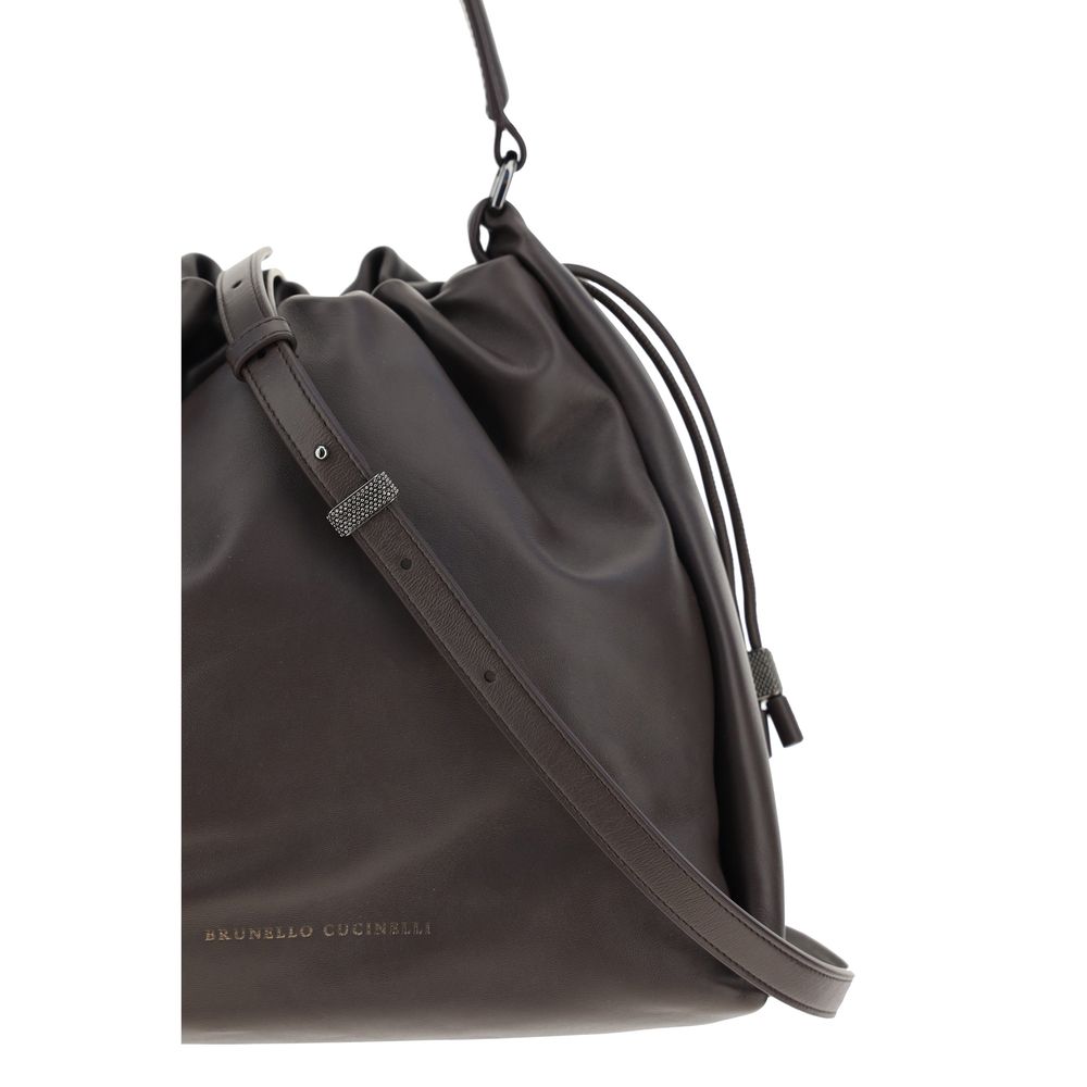 Shoulder Drawstring Bag by Brunello Cucinelli for women in bos taurus calf leather brown & signature showcases a enviable silhouette, artfully detailed with a secure drawstring, organized , and versatile shoulder-strap, handle & adjustable-strap for a enviable look.