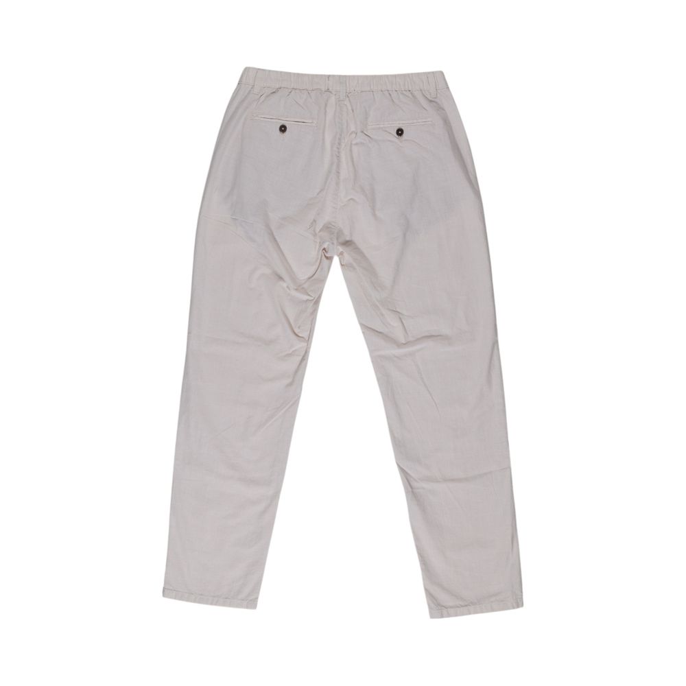 Trousers by Smiling London for men in cotton beige features a tailored silhouette with a tailored regular-fit, defined by its long and a sophisticated .