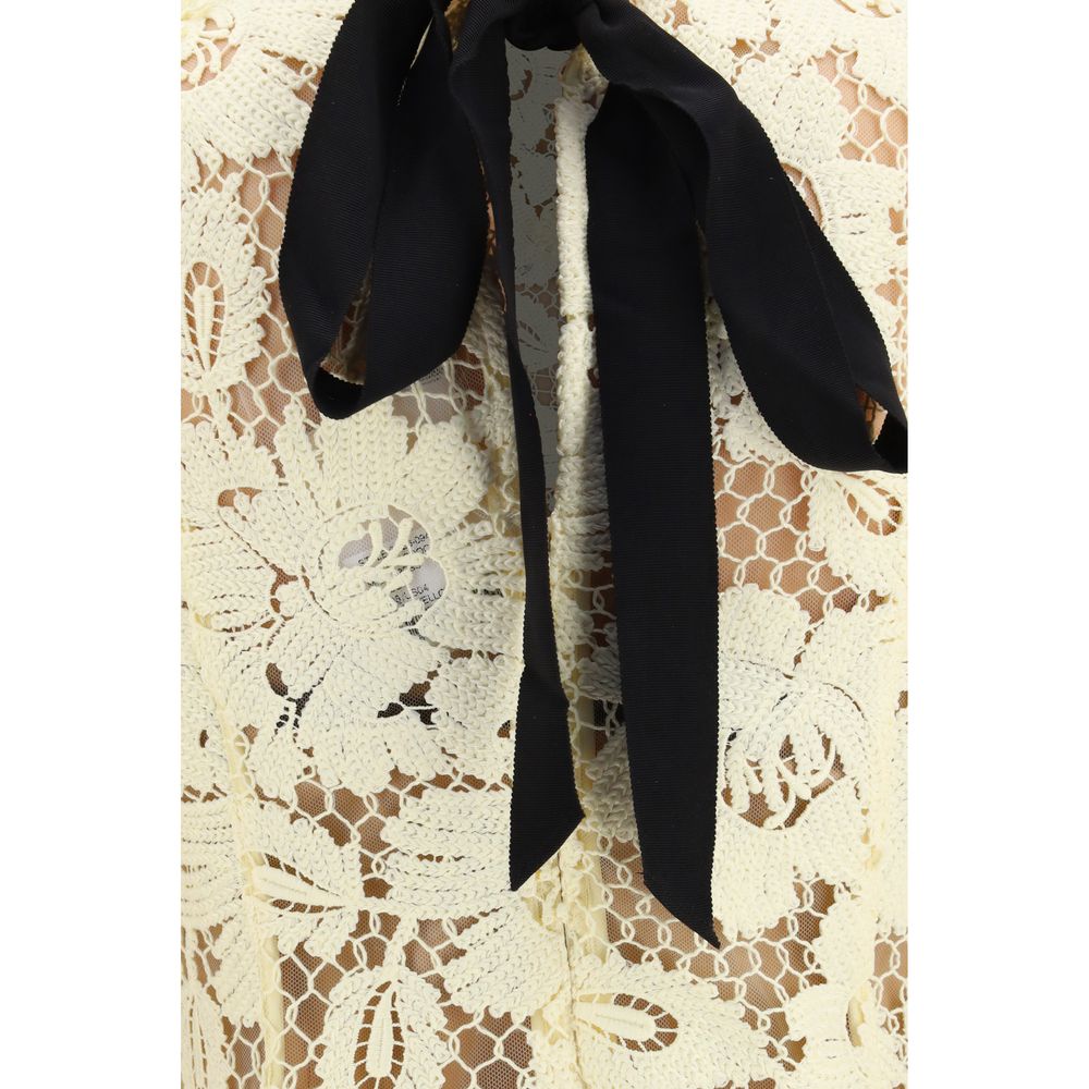 Dress by Self-Portrait for women in polyester bicolour & patterned features a dramatic silhouette, showcasing an elegant and that flows into a dramatic midi.