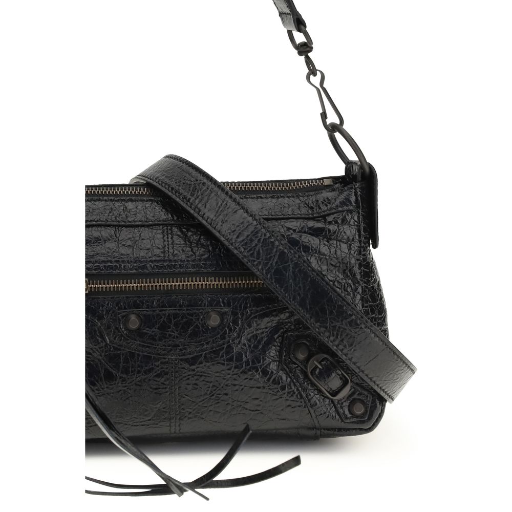 Mini Crossbody Shoulder Bag by Balenciaga for women in zamak cotton canvas calf & lambskin leather black features a effortless sophistication silhouette, secured by a zipper with ample and versatile crossbody-strap, handle & adjustable-strap for a effortless sophistication finish.