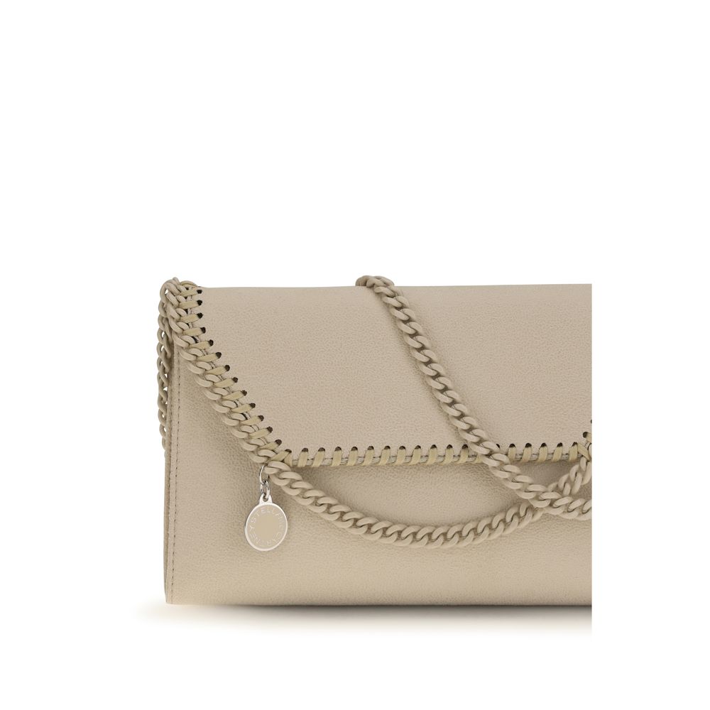Shoulder Flap Bag by Stella McCartney for women in polyester leather beige, signature, monogram & print showcases a enviable silhouette, artfully detailed with a secure flap & magnetic, organized single-compartment, and versatile shoulder-strap for a enviable look.
