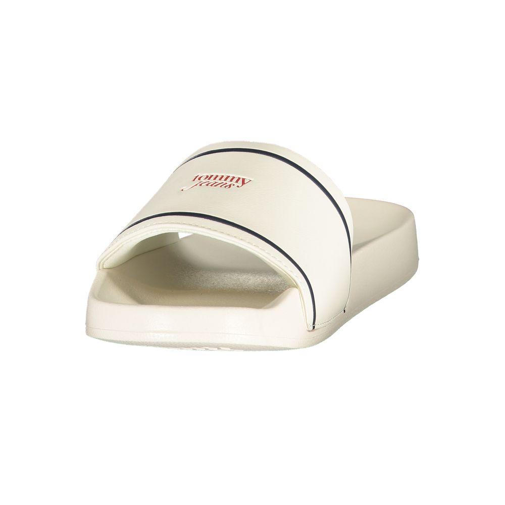 Sandals by Tommy Hilfiger for women in polyester & polyurethane and white & print presents a sculptural silhouette, showcasing the signature style of the The Blend Women's Polyester & Polyurethane Sandals with a sculptural and sculptural .