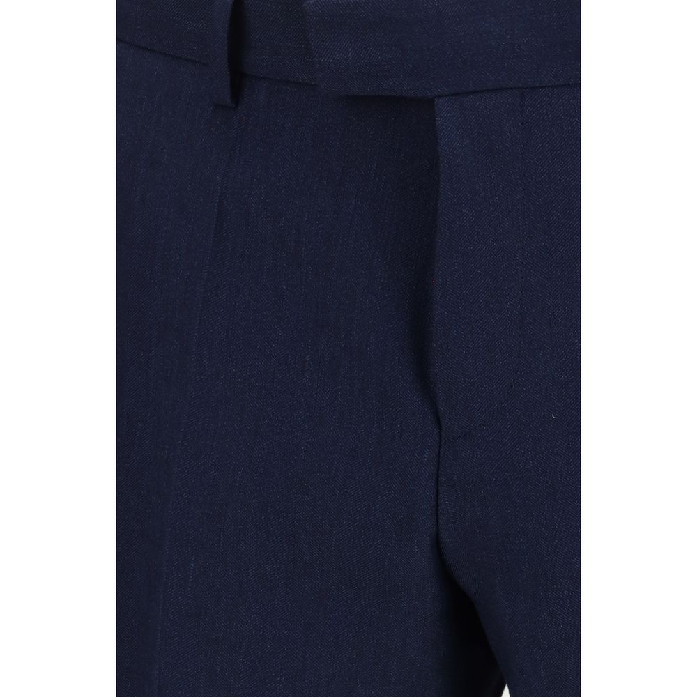 This Pant Suit by Hugo Boss Black for men in merino virgin wool & mohair black & blue presents a discerning silhouette, featuring a sophisticated and a discerning relaxed-fit & slim for a refined and polished look.