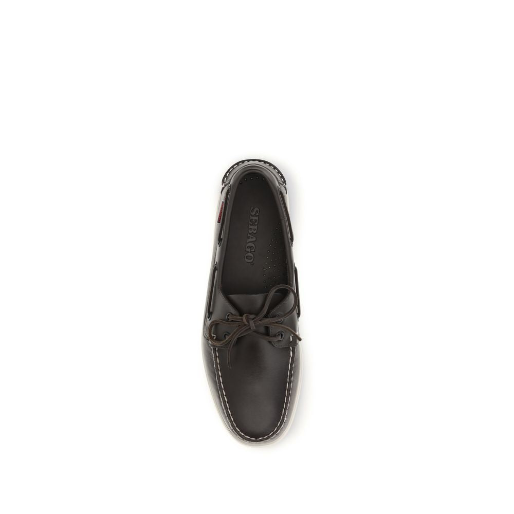 Loafer Slip-On Shoes by Sebago for men in bos taurus calf leather brown features an effortless chic silhouette, showcasing the Men's Bos Taurus Calf Leather Loafer Slip-On Shoes design with an effortless chic and a for a effortless chic look.