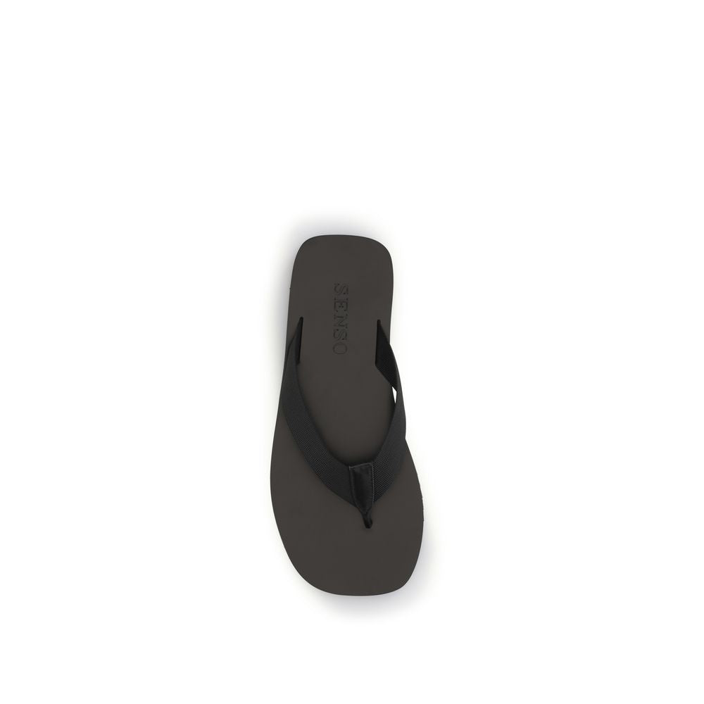 Flat Flip-Flop Thong Sandals by Senso for women in rubber & fabric black showcases a sculptural silhouette as City Women's Rubber & Fabric Flat Flip-Flop Thong Sandals, defined by a sculptural flat and sculptural for a sculptural look.