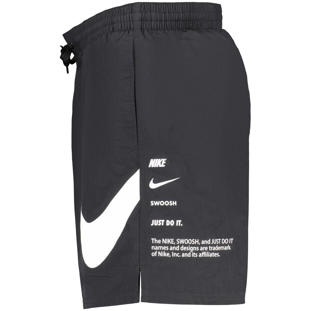 Swimwear by Nike for men in polyester black & print presents a magnificent silhouette, artfully capturing the essence of the Waves Men's Polyester Swimwear with its magnificent cut and sophisticated design.