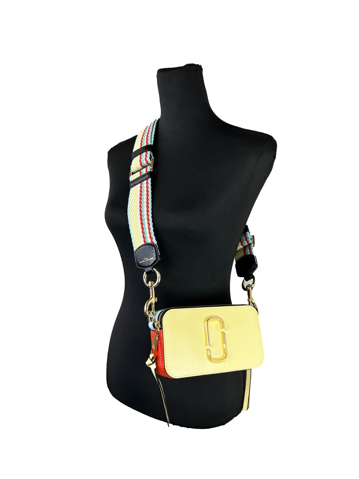 Small 2-in-1 Shoulder & Crossbody Handbag by Marc Jacobs for women in canvas gold & yellow features a versatile chic silhouette, meticulously detailed with a secure zipper, ample , and versatile crossbody-strap, shoulder-strap, adjustable-strap & detachable-strap.