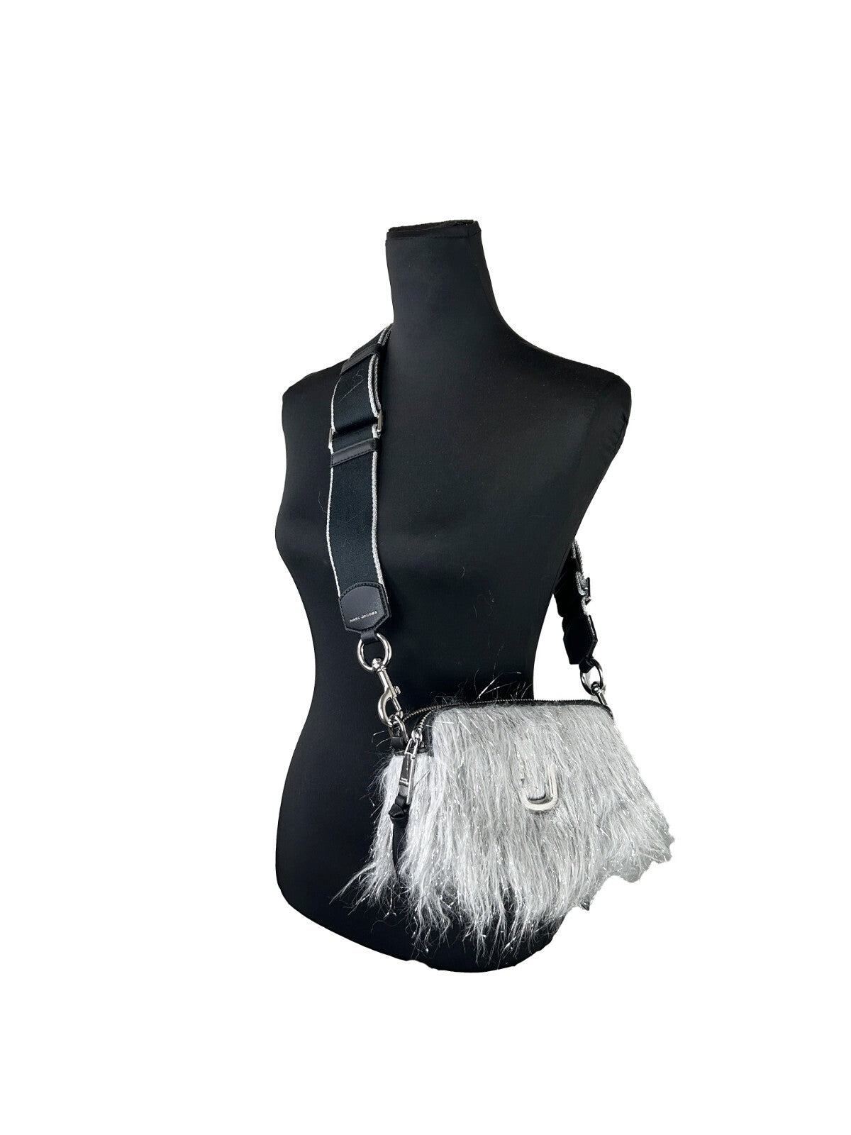 Small Crossbody Handbag by Marc Jacobs for women in leather & fur black & silver features a transformative sophistication silhouette, showcasing a secure zipper, ample , and versatile crossbody-strap, adjustable-strap & detachable-strap for a transformative sophistication look.