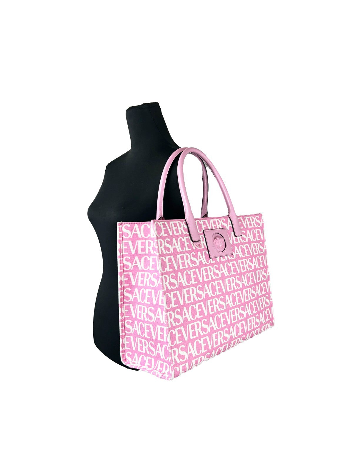 This Large Tote Bag by Versace for women in cotton polyester canvas gold, pink & patterned features an jet-set Medusa Cotton Polyester Canvas Large Tote Bag design with a secure , ample cardholder, and jet-set handle.