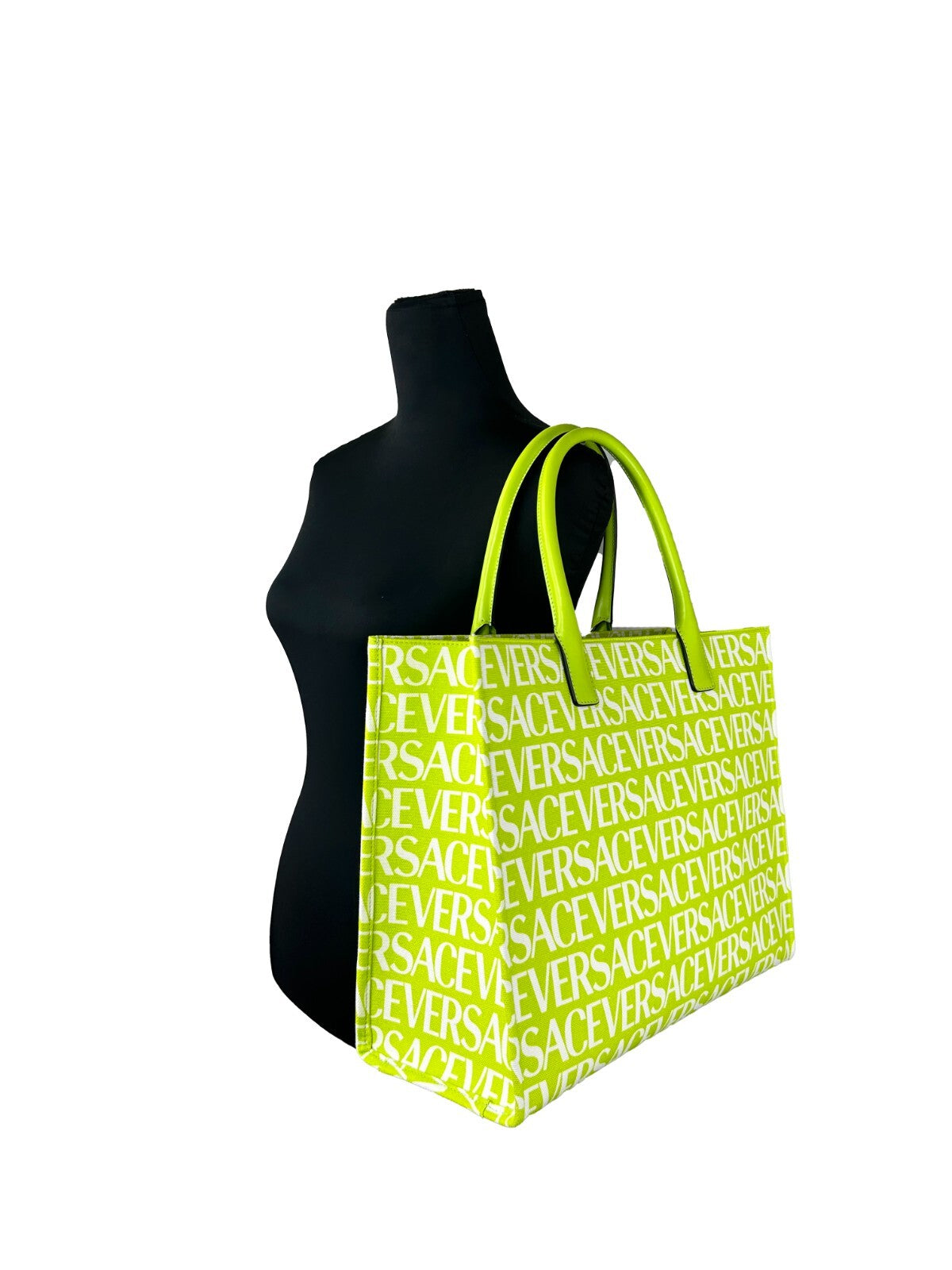 Large Travel Tote Bag by Versace for women in cotton polyester canvas gold, green & patterned features a jet-set sophisticated Medusa Cotton Polyester Canvas Large Travel Tote Bag design with a secure , ample cardholder, and versatile handle for a jet-set sophisticated finish.