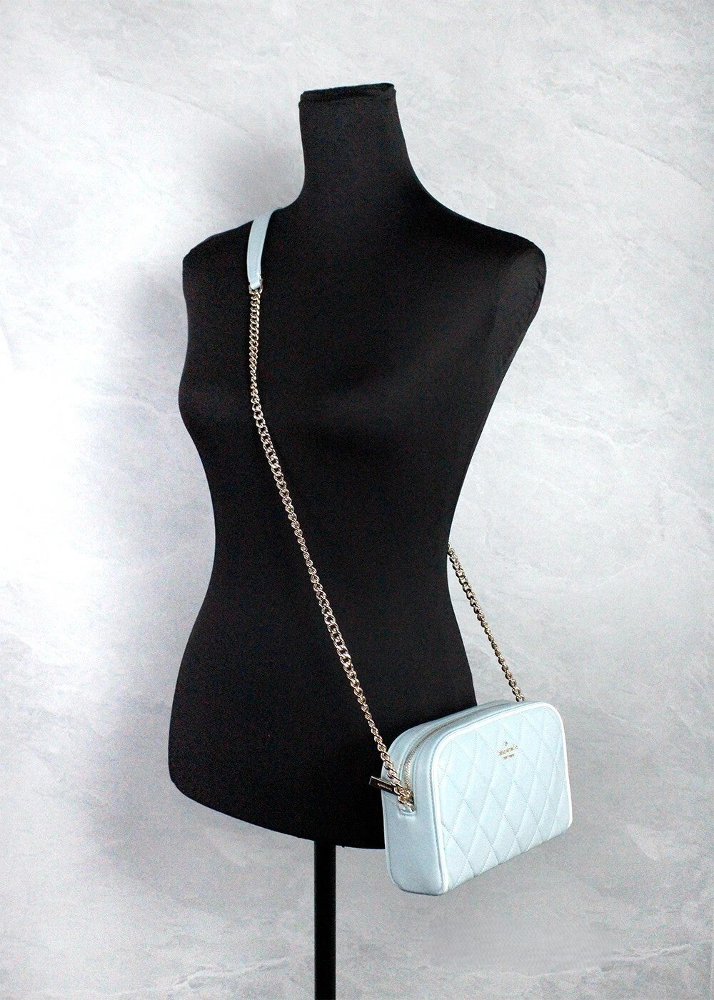 Mini Quilted Crossbody Camera Handbag by Kate Spade for women in leather gold, patterned & argyle showcases a versatile sophistication silhouette, featuring a secure zipper, versatile sophistication , and versatile crossbody-strap & adjustable-strap for a versatile sophistication finish.