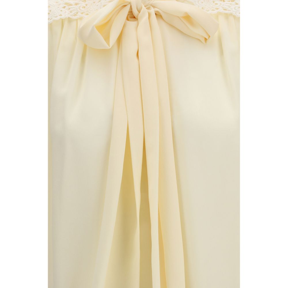 Blouse by Chloé for women in polyester beige showcases a sleek silhouette, elegantly detailed with a sleek and for a sleek finish.