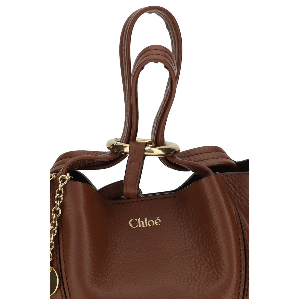 Shoulder Bag by Chloé for women in bos taurus grained leather brown & monogram features a effortless sophistication silhouette, secured by a magnetic & button with ample single-compartment and versatile shoulder-strap, handle & adjustable-strap for a effortless sophistication finish.