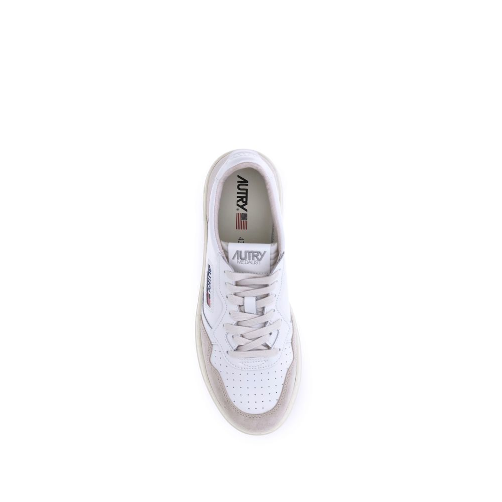 Sneakers by Autry for men in bos taurus calf suede leather white & signature presents a on trend silhouette from the Men's Low Top Bos Taurus Calf Suede Leather Sneakers collection, showcasing a on trend low-top style for an elevated aesthetic.
