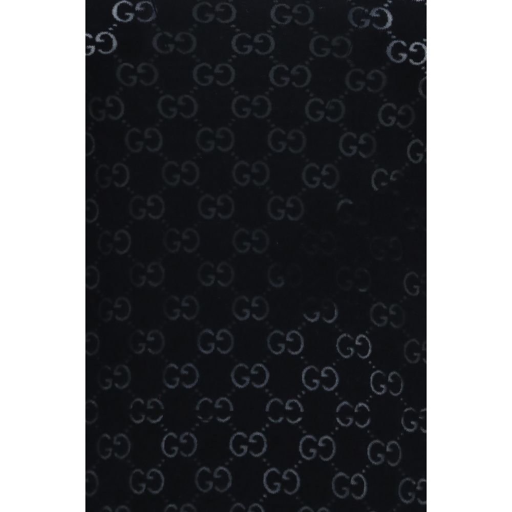 Activewear T-Shirt by Gucci for women in cotton polyester black & patterned presents a kinetic silhouette, showcasing the kinetic and alongside functional for a premium, athletic look.