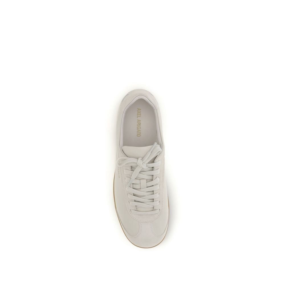 Sneakers by Axel Arigato for men in bos taurus calf suede leather beige & gold presents a on trend silhouette from the Men's Low Top Bos Taurus Calf Suede Leather Sneakers collection, showcasing a on trend low-top style for an elevated aesthetic.